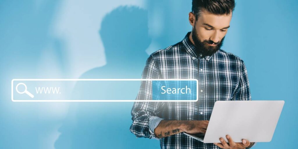 LinkedIn headline optimization - Indian B2B professional reviewing LinkedIn search results on laptop